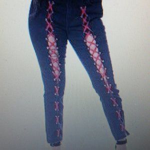 Aphrodite stretch ankle jeans w/ red laces up legs